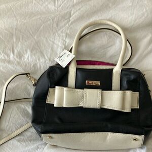 Never used black and white leather Kate Spade Purse